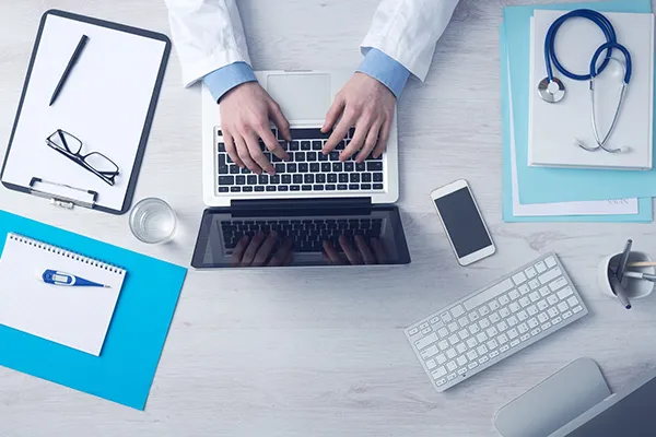 A doctor reviewing short term disability insurance options in Vero Beach, FL